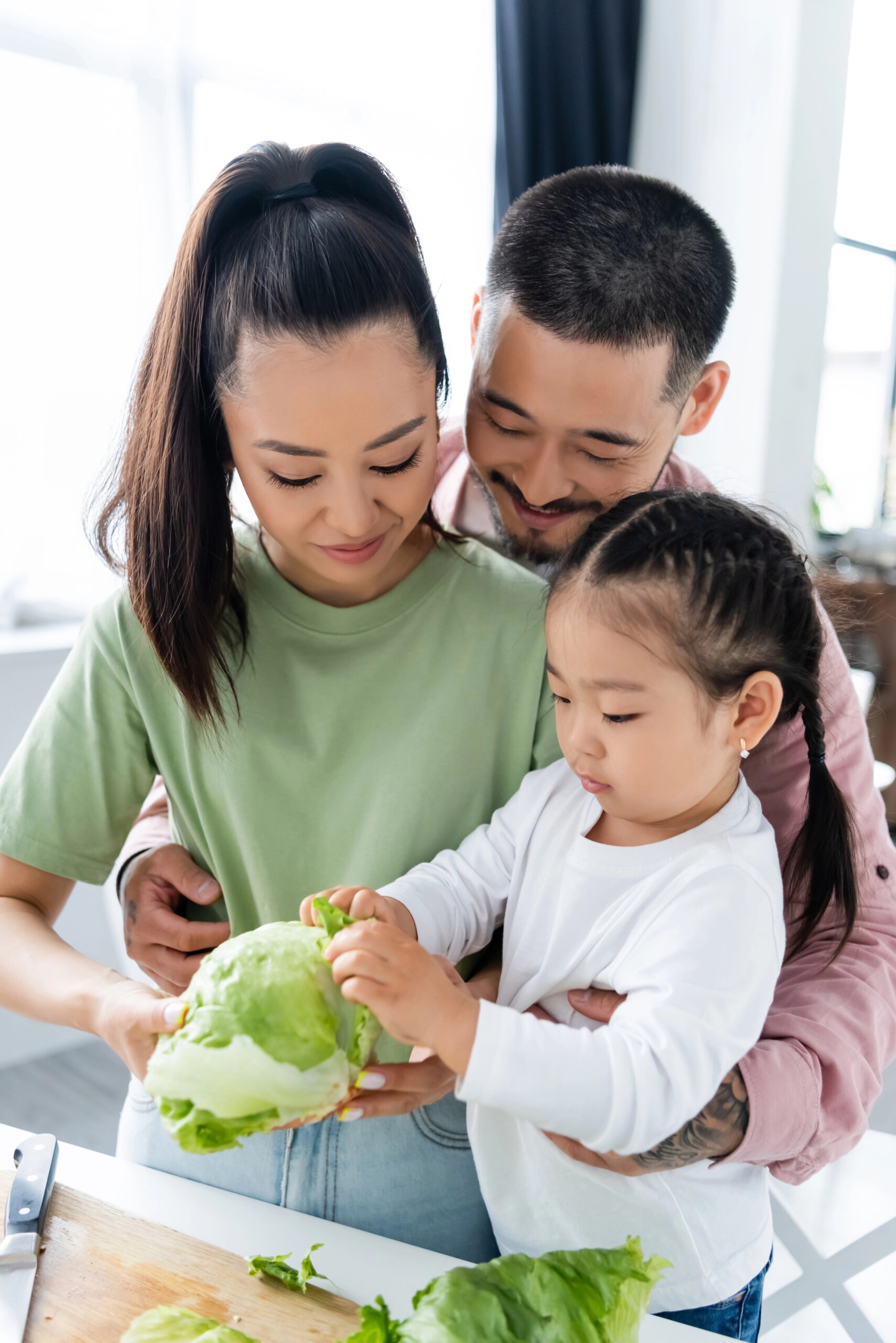 Asian family in kitchen